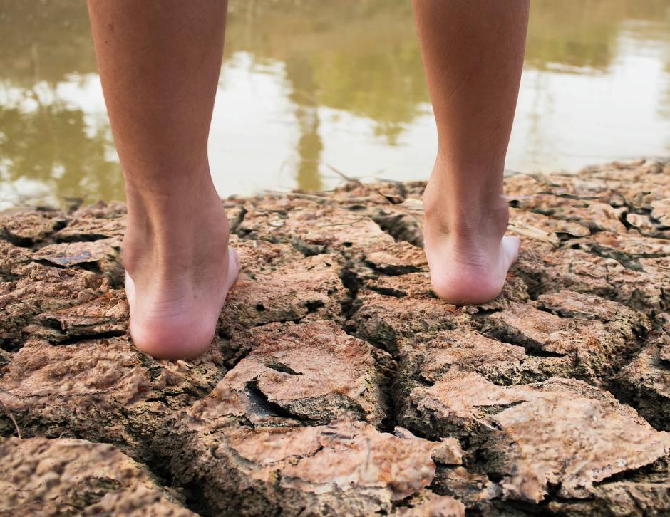 Standing in mud