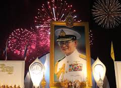 Photograph of a Father with a fireworks background